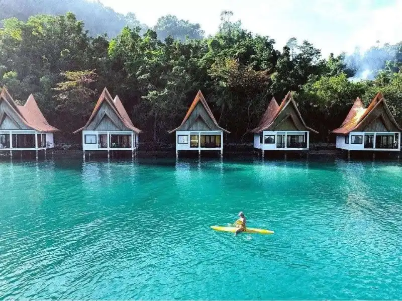 Retirement Homes and Communities kayak in torquise water